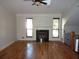 Spacious living room with hardwood floors and a fireplace at 3085 Everson Ct, Snellville, GA 30039