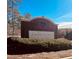 Brick entrance sign welcomes residents to Cedar Grove Village at 5732 Village Loop, Fairburn, GA 30213