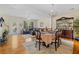 Combined living and dining area, featuring hardwood floors and a modern decor at 2555 Flat Shoals Rd # 802, Atlanta, GA 30349