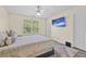A spacious main bedroom features a large bed, neutral colors, and a television for entertainment at 2555 Flat Shoals Rd # 802, Atlanta, GA 30349