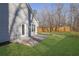 A newly seeded backyard featuring a small patio offers plenty of space for outdoor activities at 3490 Buffington Ln, Cumming, GA 30040