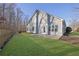 A large flat backyard with a newly seeded lawn and a wood fence is ready for recreation at 3490 Buffington Ln, Cumming, GA 30040