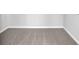 Unfinished basement with carpet and white painted baseboards at 3490 Buffington Ln, Cumming, GA 30040