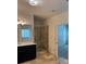 Beautiful bathroom featuring tiled floors, a double vanity and a walk in shower at 3490 Buffington Ln, Cumming, GA 30040