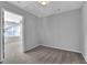 Neutral bedroom features a large window, plush carpeting and is painted with soothing gray paint at 3490 Buffington Ln, Cumming, GA 30040