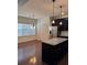 Open-concept kitchen and living area with sleek countertops at 3490 Buffington Ln, Cumming, GA 30040
