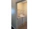 Laundry room with washer, dryer, and wire shelving at 3490 Buffington Ln, Cumming, GA 30040