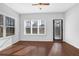 Sunroom with large windows, filling the space with natural light and scenic views at 3490 Buffington Ln, Cumming, GA 30040