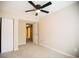 Neutral bedroom featuring a ceiling fan and closet at 724 Redland Dr, Jonesboro, GA 30238