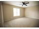 Spacious bedroom featuring plush carpet and a bright, airy atmosphere at 724 Redland Dr, Jonesboro, GA 30238