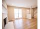 Inviting living room with a traditional fireplace and gleaming hardwood floors at 724 Redland Dr, Jonesboro, GA 30238