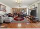 Large living room with a fireplace and hardwood floors at 1480 Niskey Lake Sw Rd, Atlanta, GA 30331