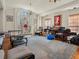 Living room with hardwood floors, arched window, and seating at 1480 Niskey Lake Sw Rd, Atlanta, GA 30331