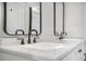 Bathroom with double vanity and sleek black faucets at 1934 Pinedale Pl, Decatur, GA 30032