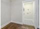 Bright laundry room with wood floors and updated tile flooring at 1934 Pinedale Pl, Decatur, GA 30032