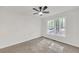 Cozy bedroom with neutral carpet and a window with views of the trees at 369 Antioch Rd, Dallas, GA 30157