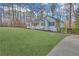 House exterior showcasing a spacious lawn and driveway at 369 Antioch Rd, Dallas, GA 30157