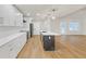 Modern kitchen with white cabinets, quartz countertops and island at 369 Antioch Rd, Dallas, GA 30157