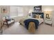 Bedroom with a queen-size bed and sitting chair at 799 River Gardens Se Dr, Atlanta, GA 30354