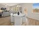 Casual breakfast nook with round table and white chairs, opens to the kitchen at 799 River Gardens Se Dr, Atlanta, GA 30354