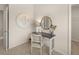 Elegant vanity with a mirror and chair in a bedroom at 799 River Gardens Se Dr, Atlanta, GA 30354