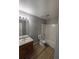 Clean bathroom with tub, toilet and vanity at 2331 Rambling Way, Lithonia, GA 30058