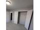 Bedroom with double-door closet and neutral decor at 2331 Rambling Way, Lithonia, GA 30058