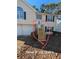 House exterior featuring new front stairs and a two-car garage at 2331 Rambling Way, Lithonia, GA 30058