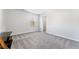 Bright bedroom featuring grey carpet, large window and closet at 3178 Cedar Crest Way, Decatur, GA 30034