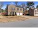 Two-story brick home with a two-car garage and landscaped yard at 3178 Cedar Crest Way, Decatur, GA 30034