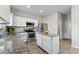 Modern kitchen with granite countertops and stainless steel appliances at 3178 Cedar Crest Way, Decatur, GA 30034