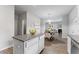 Modern kitchen island with granite countertop, view of dining area at 3178 Cedar Crest Way, Decatur, GA 30034