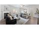 Bright living room with fireplace and hardwood floors at 3178 Cedar Crest Way, Decatur, GA 30034