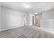 Spacious loft area with grey carpeting and multiple doors at 3178 Cedar Crest Way, Decatur, GA 30034