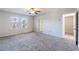 Bright bedroom with ceiling fan and neutral decor at 4839 Dufour Dr, Lilburn, GA 30047