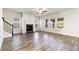 Bright living room with hardwood floors, fireplace, and ceiling fan at 4839 Dufour Dr, Lilburn, GA 30047