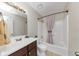 Clean bathroom with a tub shower combo and vanity at 5514 Park S Pl, Atlanta, GA 30349