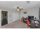 Bedroom with home office, ceiling fan, and closet at 5514 Park S Pl, Atlanta, GA 30349