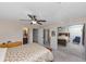 Main bedroom with mirrored closet and ceiling fan at 5514 Park S Pl, Atlanta, GA 30349