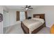 Main bedroom with ceiling fan and mirrored closet at 5514 Park S Pl, Atlanta, GA 30349