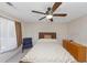 Bedroom with a ceiling fan and dresser at 5514 Park S Pl, Atlanta, GA 30349