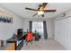 Bedroom featuring a ceiling fan and home office at 5514 Park S Pl, Atlanta, GA 30349