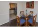 Small dining area with glass table and four chairs at 5514 Park S Pl, Atlanta, GA 30349