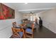 Dining area with view into living room and kitchen at 5514 Park S Pl, Atlanta, GA 30349