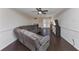 Living room with sectional sofa, fireplace, and hardwood floors at 5514 Park S Pl, Atlanta, GA 30349