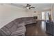 Spacious living room featuring a fireplace and large sectional sofa at 5514 Park S Pl, Atlanta, GA 30349