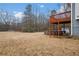 Spacious backyard with deck, above ground pool, and shed at 23 Faith Ct, Douglasville, GA 30134