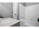 Updated bathroom with a bathtub and shower at 23 Faith Ct, Douglasville, GA 30134