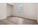 Bright bedroom featuring wood-look floors at 23 Faith Ct, Douglasville, GA 30134