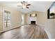 Living room features hardwood floors and a fireplace at 23 Faith Ct, Douglasville, GA 30134